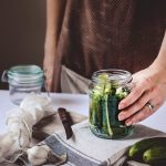 pickle jar on white textile